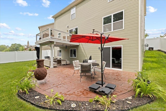 14236 Marshall Dr, Redford, MI 48239 - back of house featuring a balcony, a fenced backyard, a patio, and an outdoor living space with a fire pit