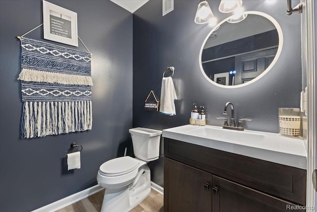 14236 Marshall Dr, Redford, MI 48239 - bathroom featuring wood finished floors and vanity