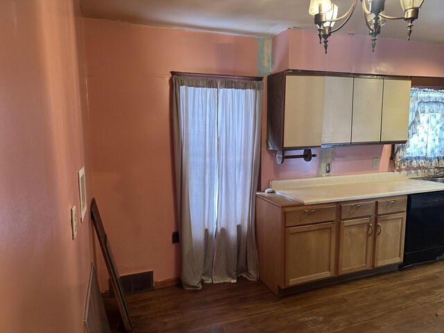 8942 28th Ave, Bitely, MI 49309 - kitchen featuring dishwasher, dark wood-style floors, light countertops, a chandelier, and hanging light fixtures