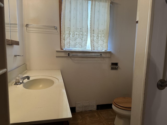 8942 28th Ave, Bitely, MI 49309 - bathroom with toilet and vanity