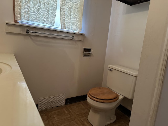 8942 28th Ave, Bitely, MI 49309 - bathroom featuring toilet and vanity