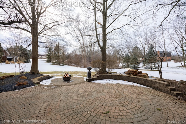 1180 Knob Creek Dr, Rochester, MI 48306 - yard layered in snow with an outdoor fire pit and a patio