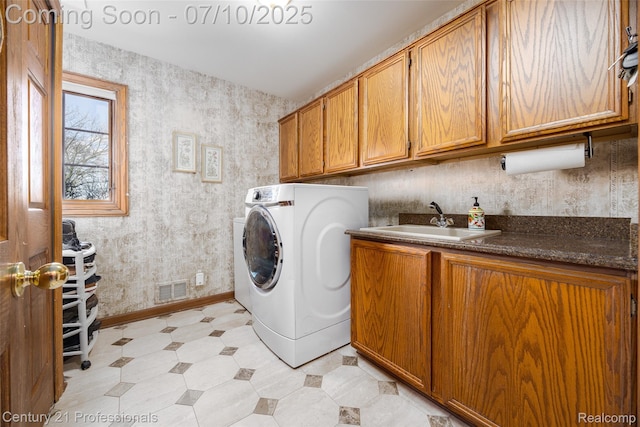 1180 Knob Creek Dr, Rochester, MI 48306 - laundry room featuring cabinet space, washer / clothes dryer, wallpapered walls, and light flooring