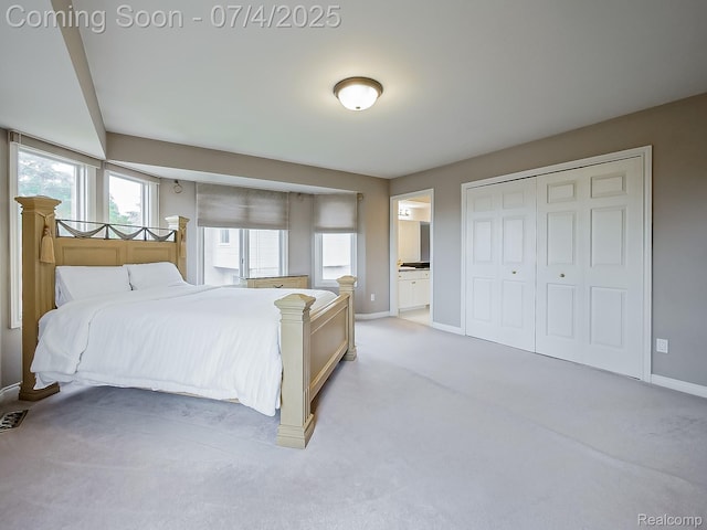 926 Majestic, Rochester Hills, MI 48306 - bedroom featuring light colored carpet, ensuite bathroom, and a closet