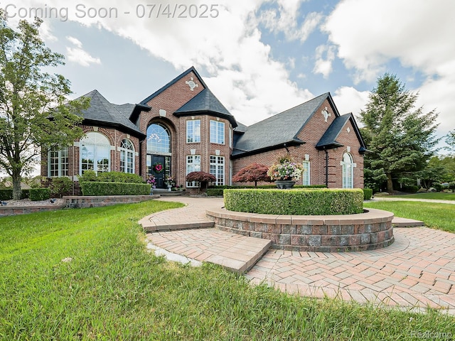 926 Majestic, Rochester Hills, MI 48306 - view of front of home with brick siding and a front lawn