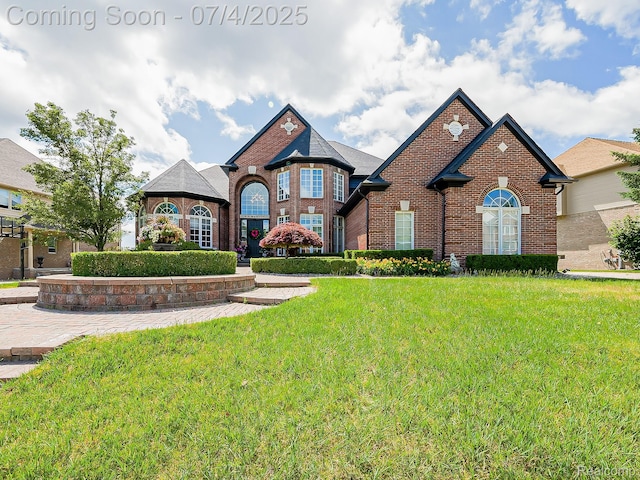 926 Majestic, Rochester Hills, MI 48306 - french country style house with brick siding and a front yard