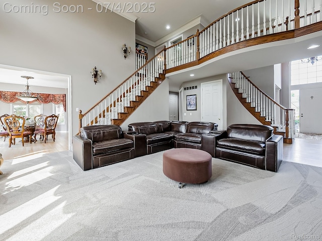 926 Majestic, Rochester Hills, MI 48306 - carpeted living room with a towering ceiling, stairs, ornamental molding, and recessed lighting