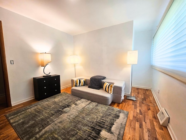 3374 Elmwood St, Clio, MI 48420 - sitting room featuring wood finished floors and baseboards