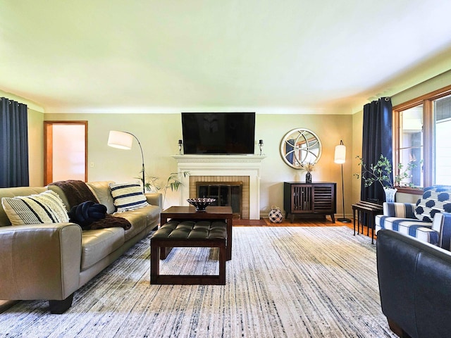 3374 Elmwood St, Clio, MI 48420 - living room featuring a fireplace and wood finished floors
