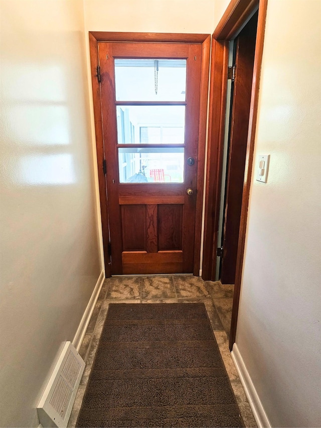 3374 Elmwood St, Clio, MI 48420 - doorway to outside with baseboards