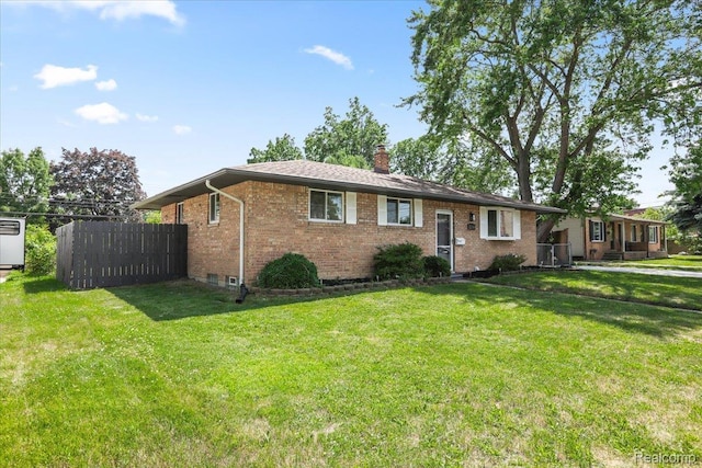 22266 E Schafer St, Clinton Township, MI 48035 - ranch-style house with a chimney and brick siding