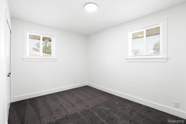 22266 E Schafer St, Clinton Township, MI 48035 - empty room with baseboards and dark carpet