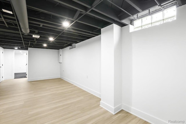 22266 E Schafer St, Clinton Township, MI 48035 - below grade area featuring baseboards and wood finished floors