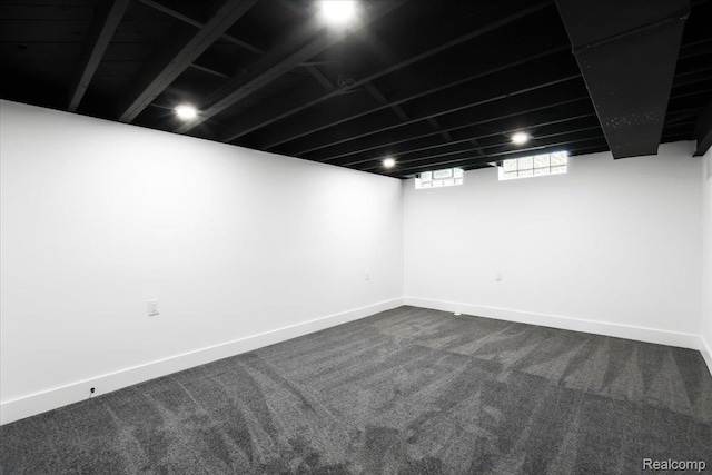 22266 E Schafer St, Clinton Township, MI 48035 - basement with dark colored carpet and baseboards