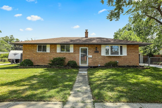 22266 E Schafer St, Clinton Township, MI 48035 - view of front of home featuring brick siding, a chimney, and roof with shingles