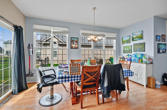 34658 Pine Vly, Richmond, MI 48062 - dining room with a chandelier, wood finished floors, and plenty of natural light