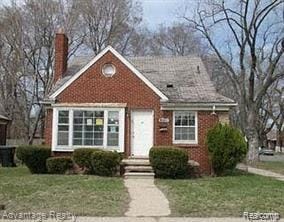 10700 Curtis St, Canton, MI 48221 - bungalow-style home featuring a chimney, a front lawn, and brick siding