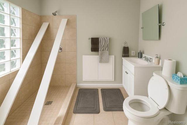 13516 Mansfield St, Detroit, MI 48227 - bathroom featuring vanity, a tile shower, and tile patterned flooring