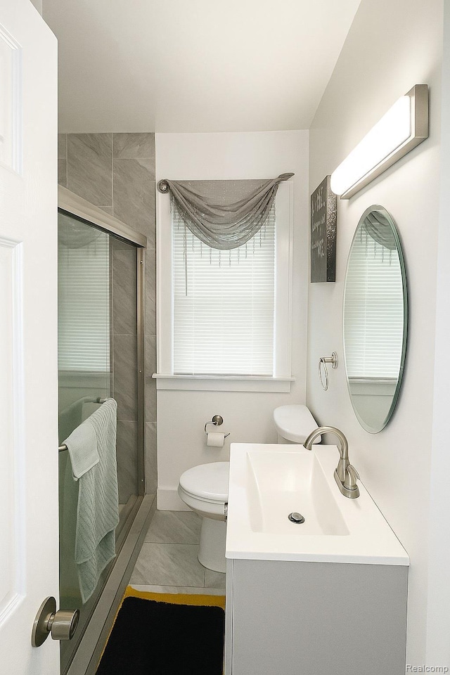 13516 Mansfield St, Detroit, MI 48227 - bathroom with vanity, a shower stall, and marble finish flooring