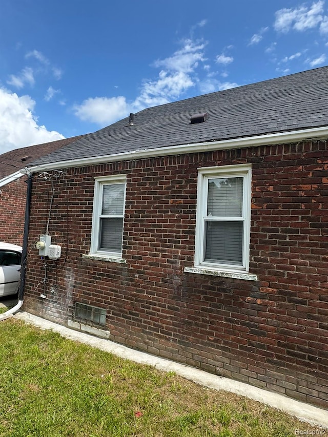 2544 S Beatrice St, Detroit, MI 48217 - view of home's exterior with brick siding and roof with shingles