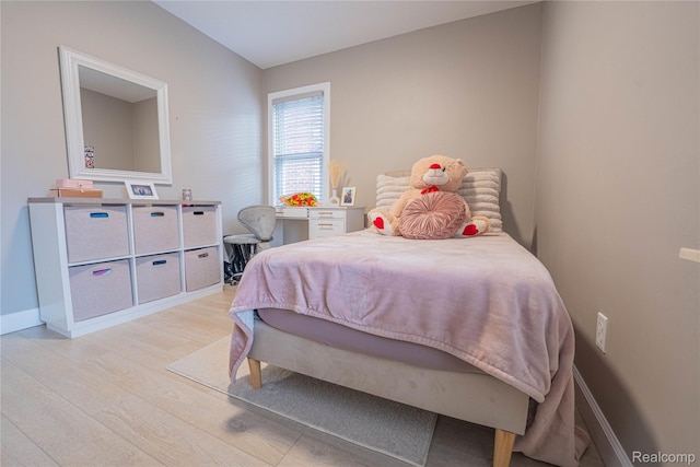 2544 S Beatrice St, Detroit, MI 48217 - bedroom with light wood-style floors and baseboards