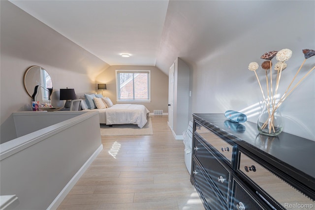 2544 S Beatrice St, Detroit, MI 48217 - bedroom with lofted ceiling and light wood-type flooring