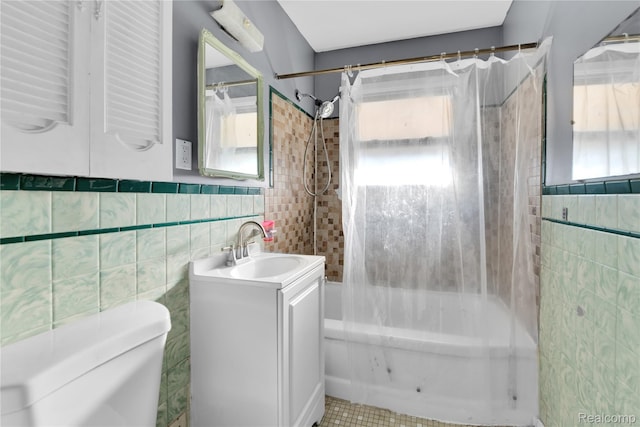 22610 Karam Ct, Macomb, MI 48091 - bathroom with tile walls, shower / bathtub combination with curtain, vanity, and tile patterned flooring