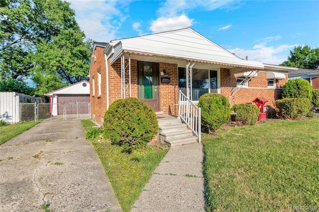 22610 Karam Ct, Macomb, MI 48091 - bungalow-style house with brick siding, an outbuilding, a garage, and covered porch