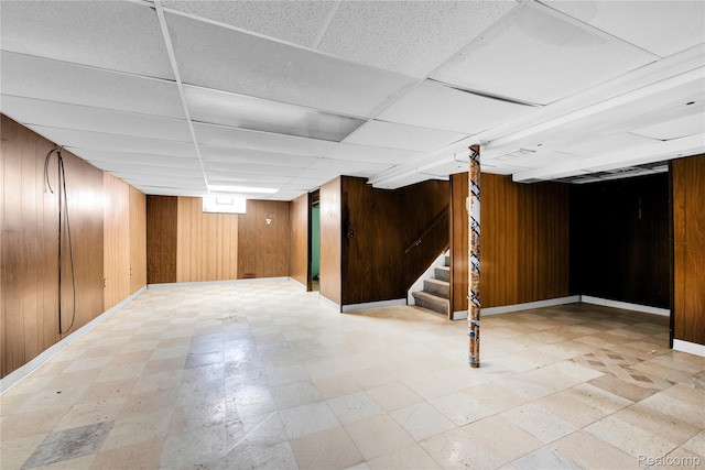 22610 Karam Ct, Macomb, MI 48091 - finished below grade area featuring wooden walls, stairs, light flooring, and a paneled ceiling