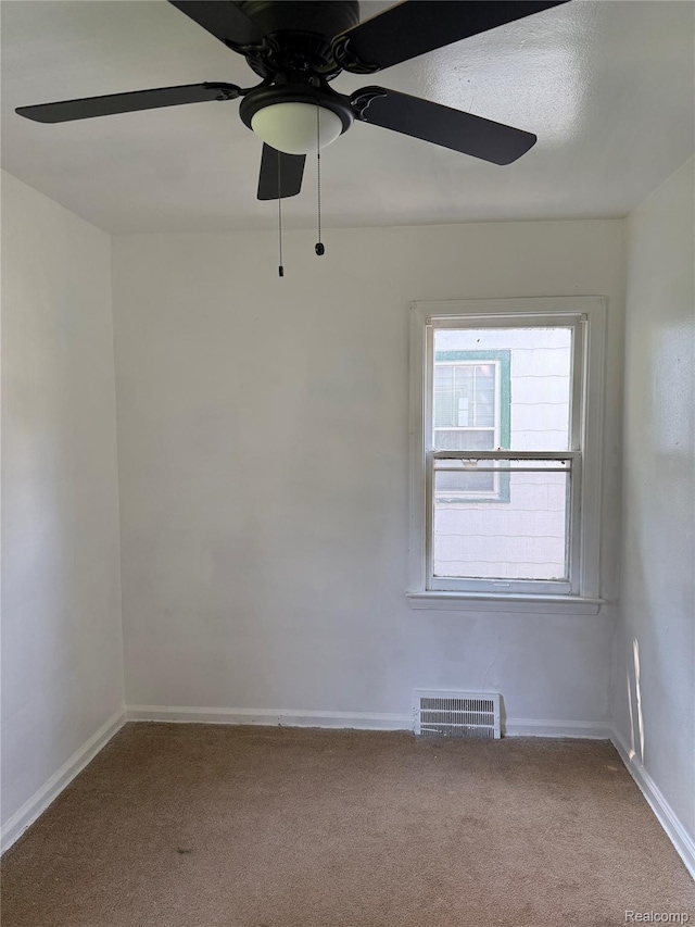 18824 Helen St, Detroit, MI 48234 - empty room with ceiling fan and carpet flooring