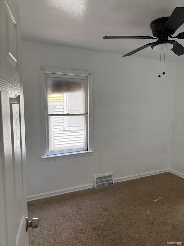 18824 Helen St, Detroit, MI 48234 - carpeted spare room with baseboards and ceiling fan