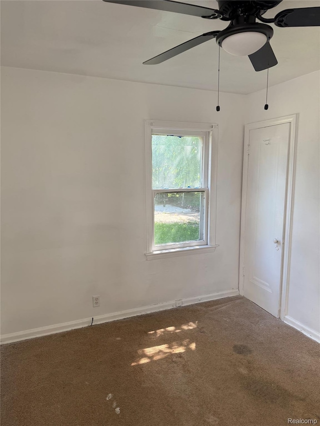 18824 Helen St, Detroit, MI 48234 - carpeted empty room with ceiling fan and baseboards