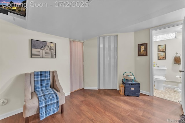 4910 Julius Blvd, Westland, MI 48186 - sitting room with wood finished floors and baseboards