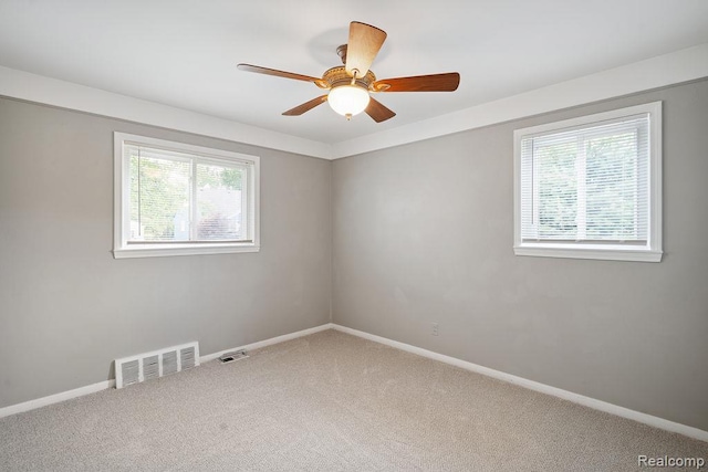 23631 Beverly St, Saint Clair Shores, MI 48082 - spare room with carpet floors and a ceiling fan