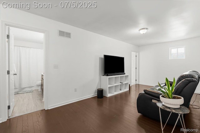 21422 Navarra Dr, South Lyon, MI 48178 - living area featuring wood finished floors and baseboards
