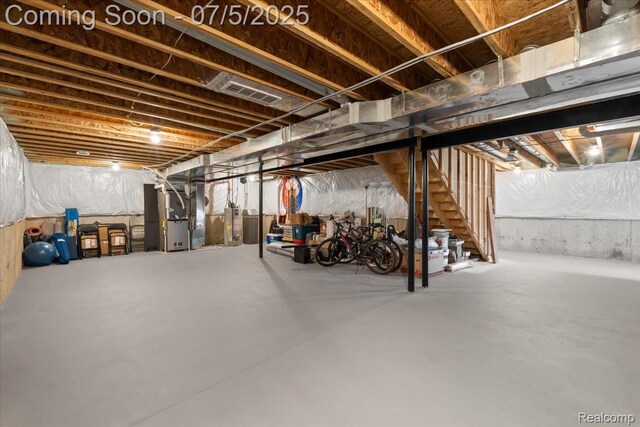 21422 Navarra Dr, South Lyon, MI 48178 - unfinished basement featuring heating unit and stairs