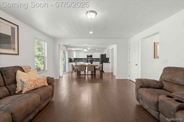21422 Navarra Dr, South Lyon, MI 48178 - living room with dark wood finished floors and recessed lighting