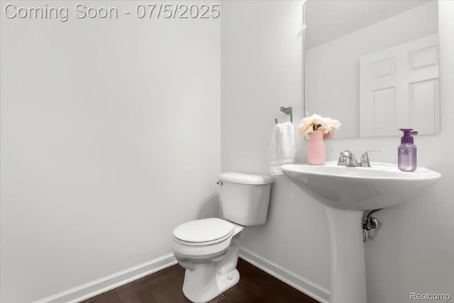 21422 Navarra Dr, South Lyon, MI 48178 - bathroom featuring toilet and wood finished floors