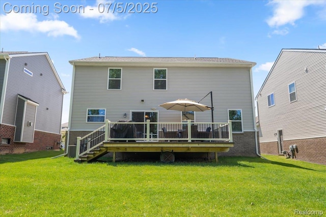 21422 Navarra Dr, South Lyon, MI 48178 - back of house with a lawn and a wooden deck