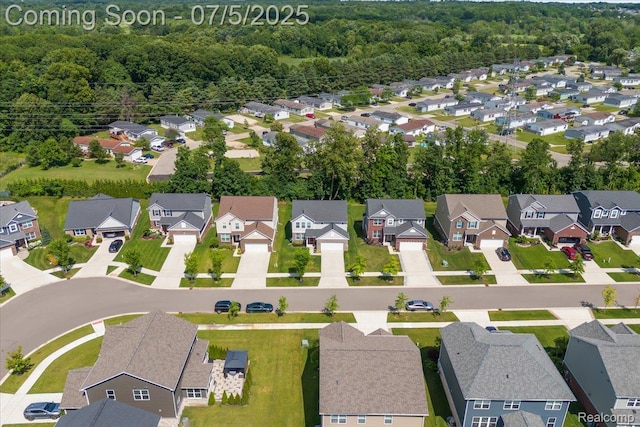 21422 Navarra Dr, South Lyon, MI 48178 - aerial perspective of suburban area with a forest