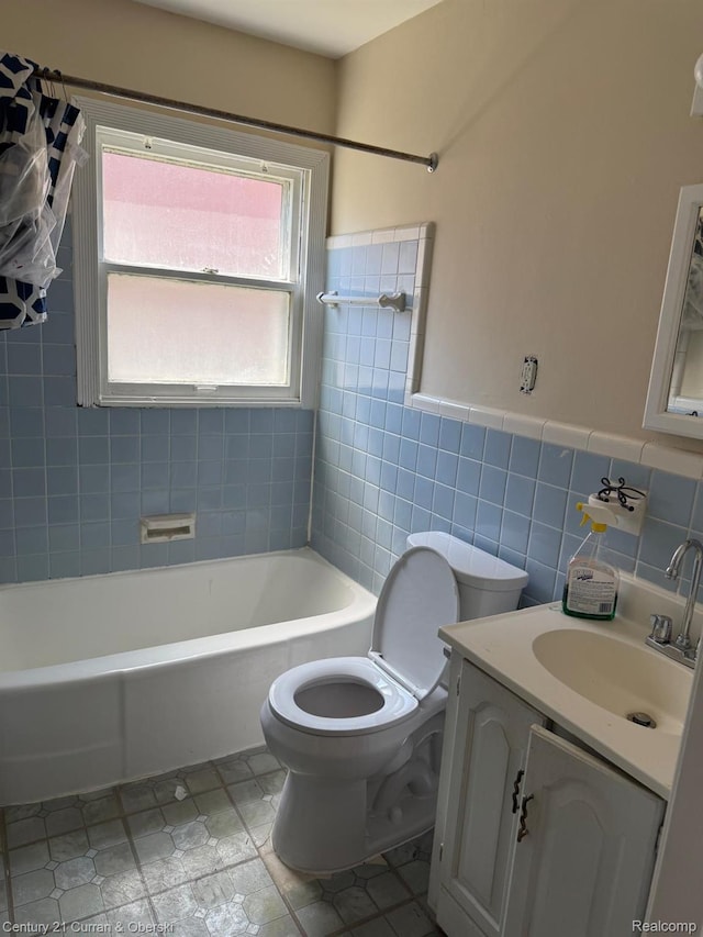 10056 Garfield, Redford, MI 48239 - full bath with tile walls, vanity, and shower / tub combo