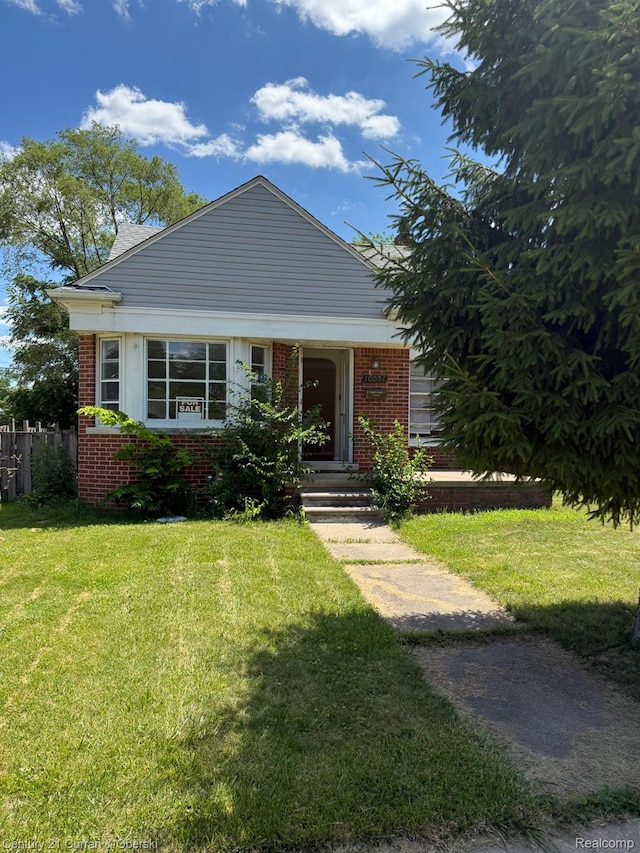 10056 Garfield, Redford, MI 48239 - view of front of house with brick siding and a front lawn