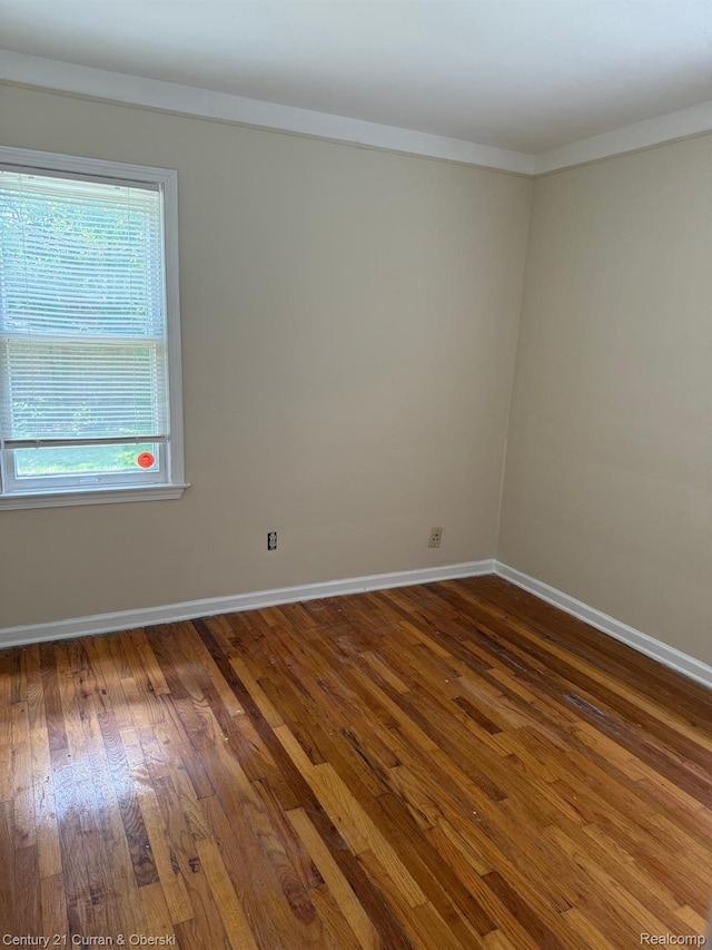 10056 Garfield, Redford, MI 48239 - empty room with dark wood-style flooring and baseboards