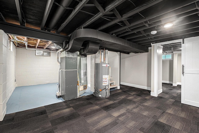 1816 Jennette Ave NW, Grand Rapids, MI 49504 - basement with gas water heater, heating unit, and dark carpet