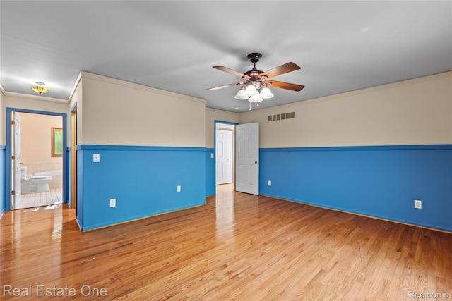 51992 Boland Rd, Chesterfield, MI 48047 - empty room with ceiling fan, wood finished floors, and ornamental molding