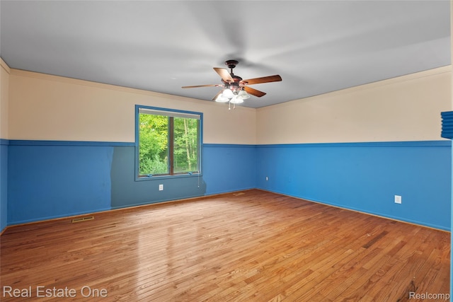 51992 Boland Rd, Chesterfield, MI 48047 - unfurnished room featuring a ceiling fan and wood finished floors