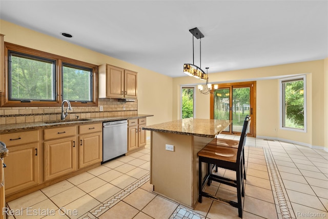 51992 Boland Rd, Chesterfield, MI 48047 - kitchen featuring stainless steel dishwasher, light tile patterned floors, tasteful backsplash, a center island, and a chandelier
