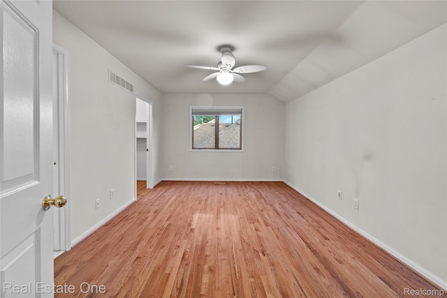51992 Boland Rd, Chesterfield, MI 48047 - unfurnished bedroom featuring light wood finished floors, lofted ceiling, and ceiling fan