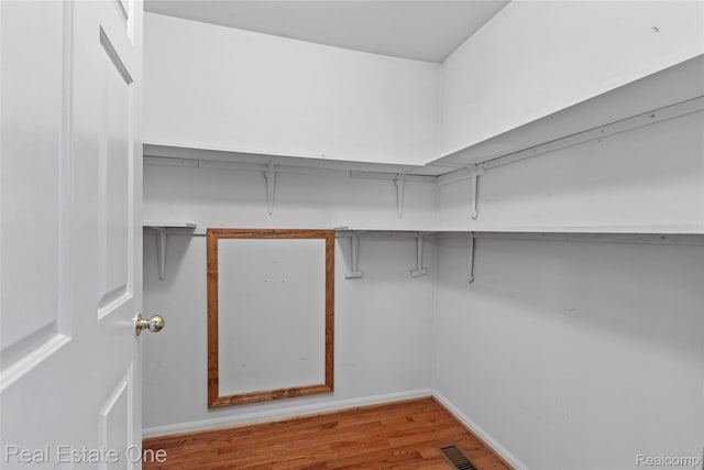 51992 Boland Rd, Chesterfield, MI 48047 - spacious closet featuring wood finished floors