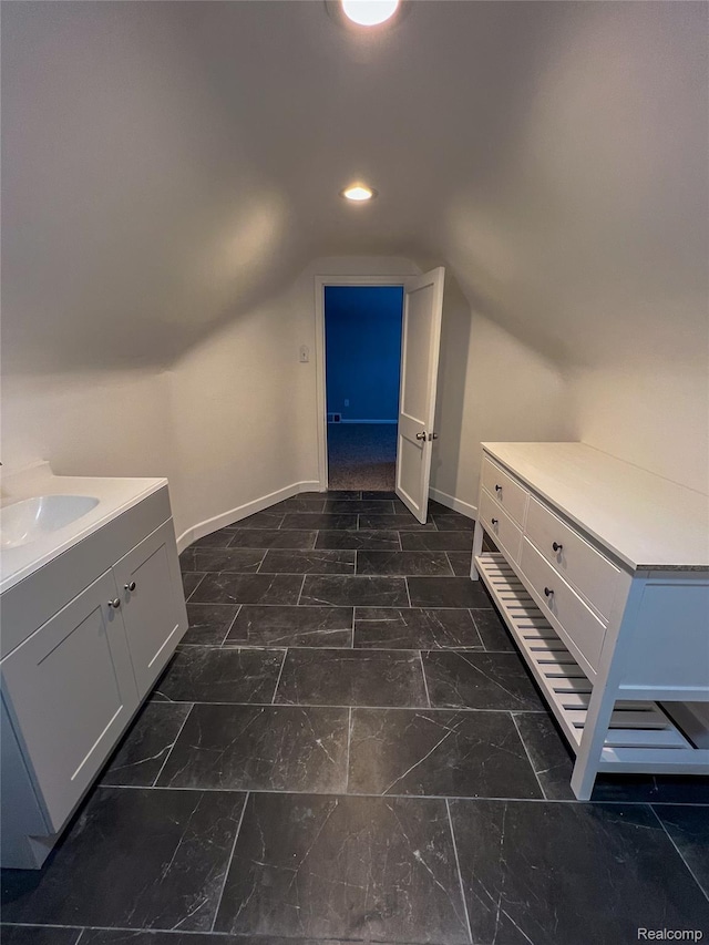 4651 Berkshire St, Detroit, MI 48224 - bathroom featuring lofted ceiling, vanity, and recessed lighting